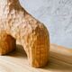 Hand-carved soliflore vase in solid chestnut wood.