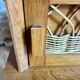 Vintage bedside table in wood & woven rattan