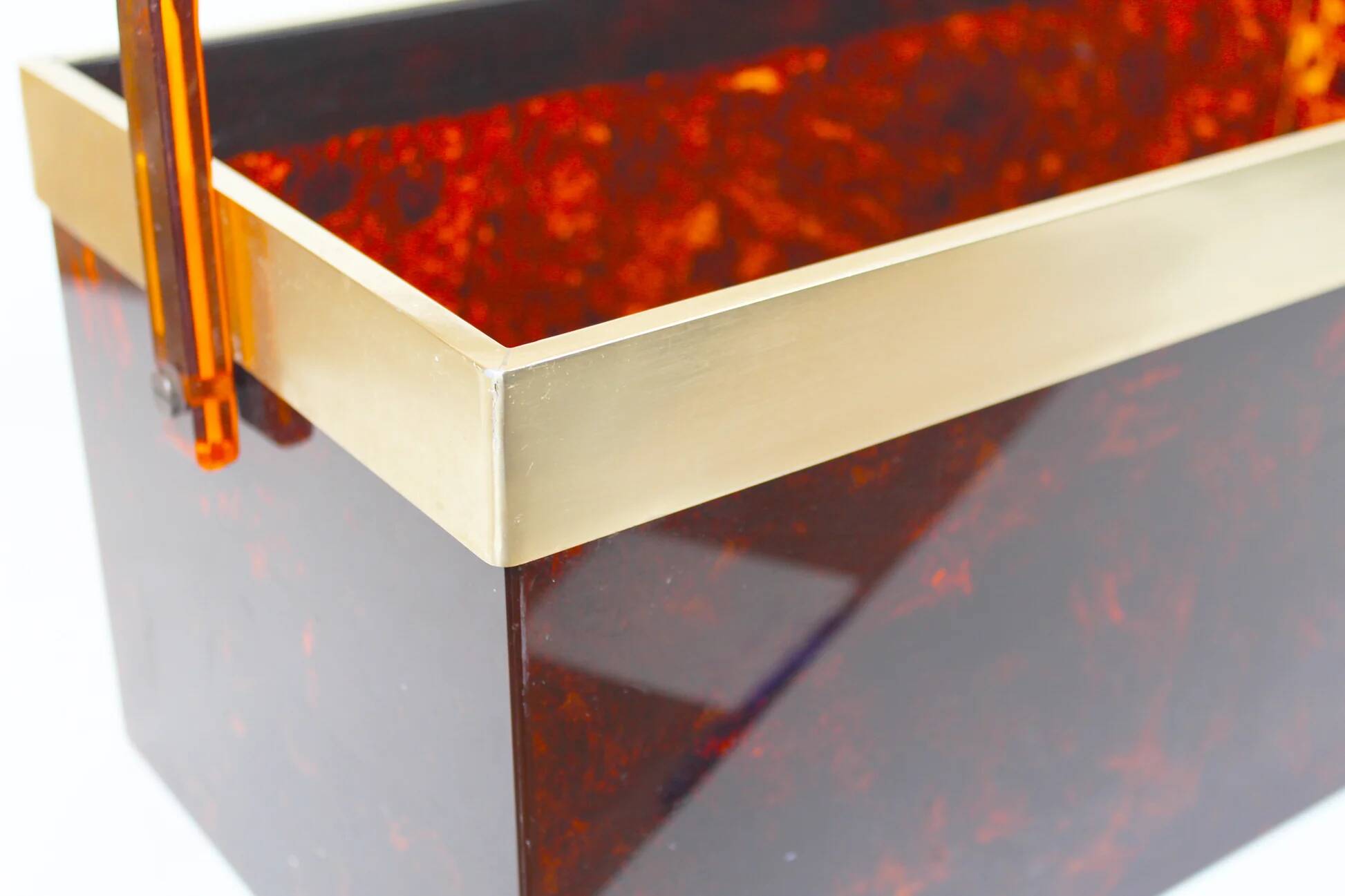 Italian magazine rack in 'faux tortoiseshell' and brass