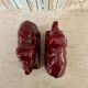 Pair of burgundy ceramic “Elephants” bookends