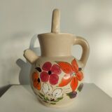 Pitcher ball in sandstone with floral pattern