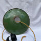 Old green and white enamelled sheet metal suspension