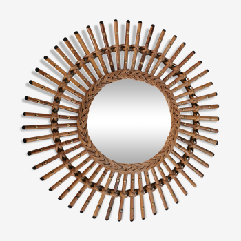 Old rattan mirror with rivets