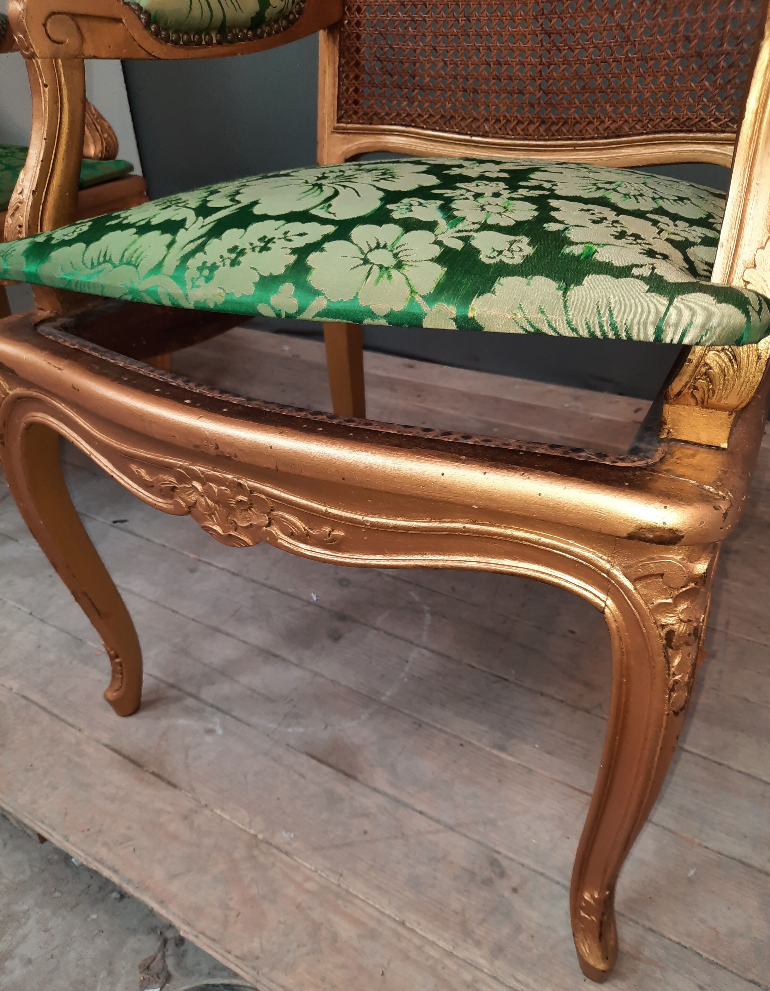 Louis XV-style golden armchair pair