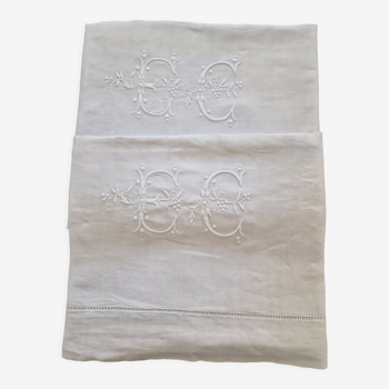 Pair of hand-embroidered white linen antique sheets