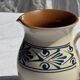 Vintage white pitcher with stylized blue plant frieze H17.5