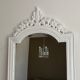 Mirror with decorated pediment 148x74cm