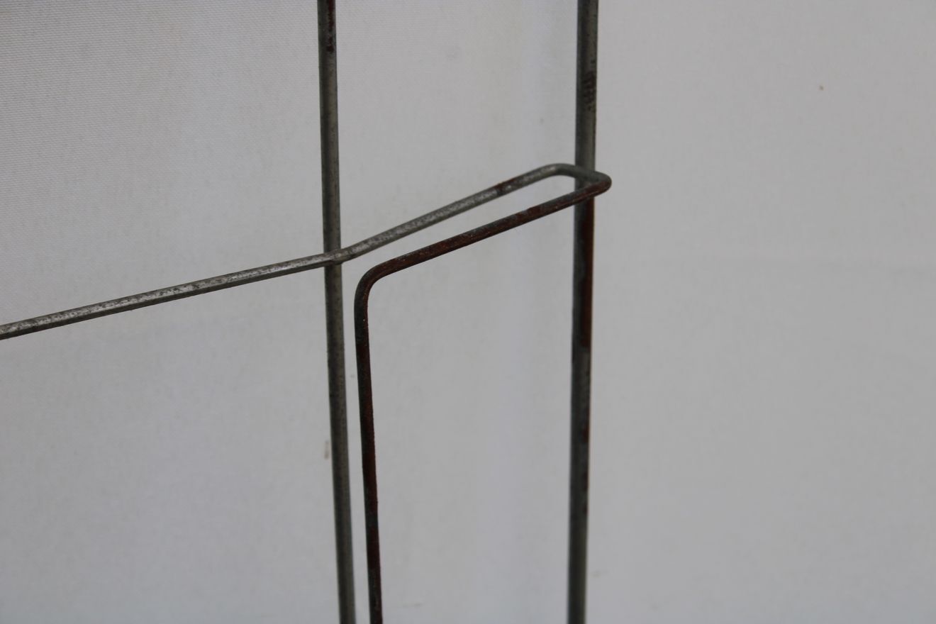 Former metal newspaper display