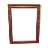 Old frame in worked wood