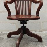 Old American office chair rounded around 1940 in oak