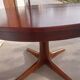 round/oval table with extension, central leg, dark shade, Baumann design