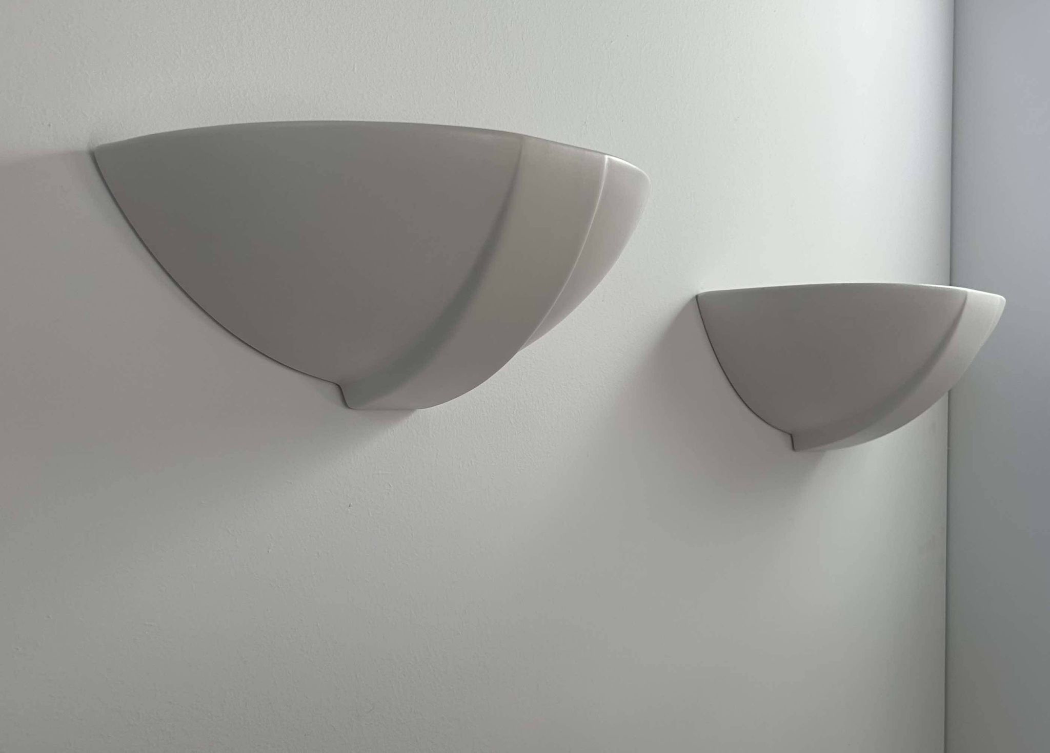 Pair of vintage matte white porcelain wall lights, France 1970.