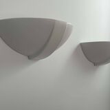Pair of vintage matte white porcelain wall lights, France 1970.