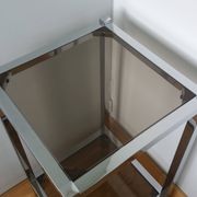 Chrome metal and smoked glass console
