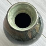 Signed ceramic vase.