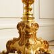 "Pique candle" double fire floor lamp in gilded bronze