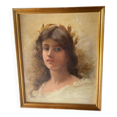 Portrait of a young woman with a laurel crown.