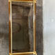 Gold metal coffee table with elm burl imitation.