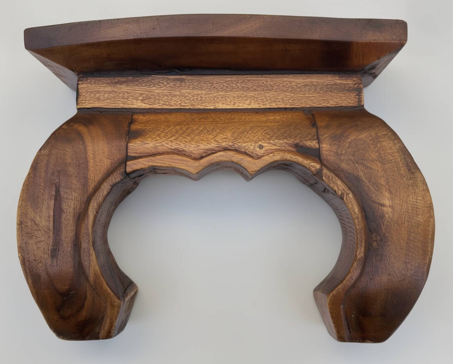 Carved wooden opium holder, traditional Asian style.