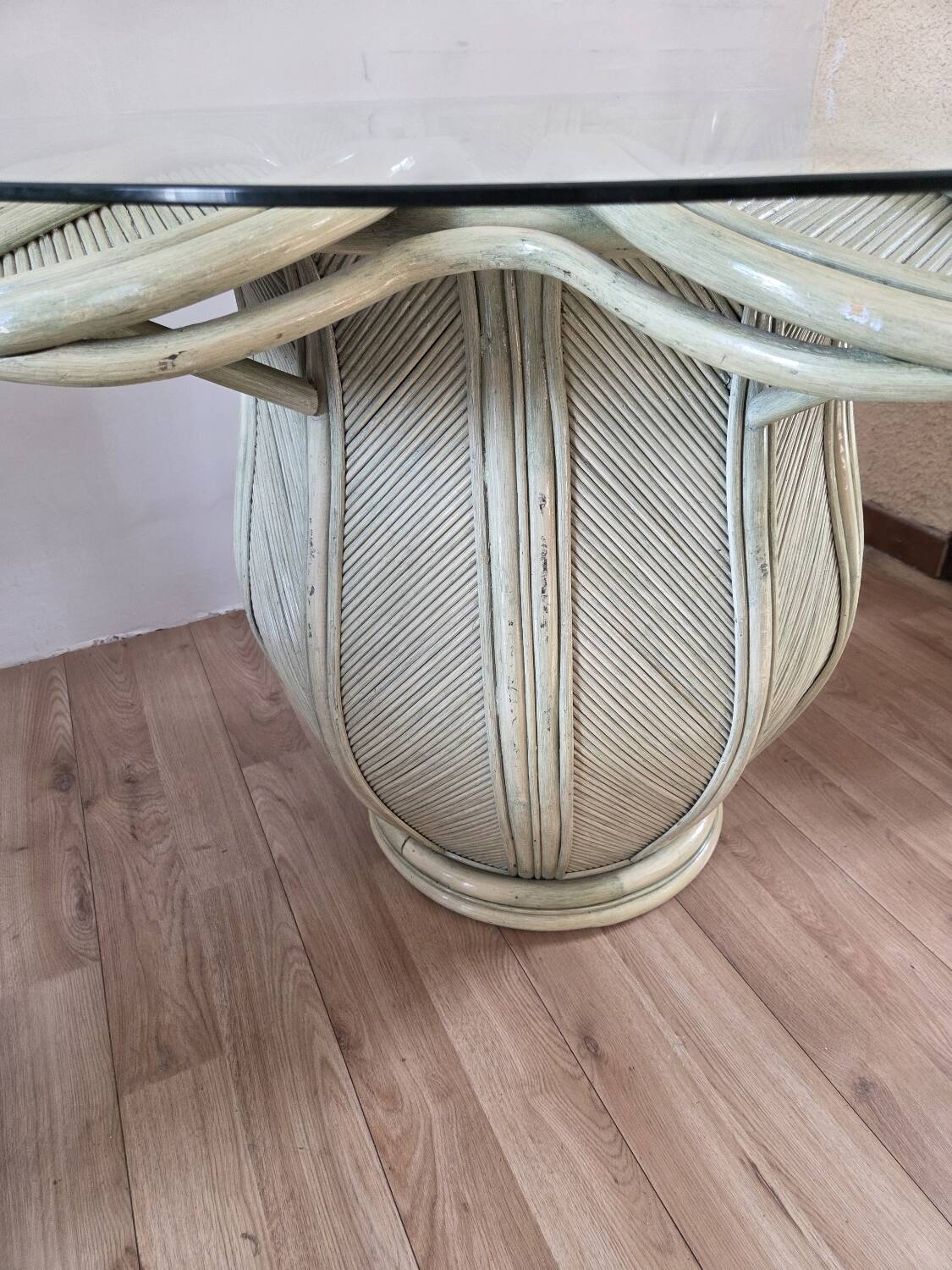 Dining table with a floral design in rattan, 1970.