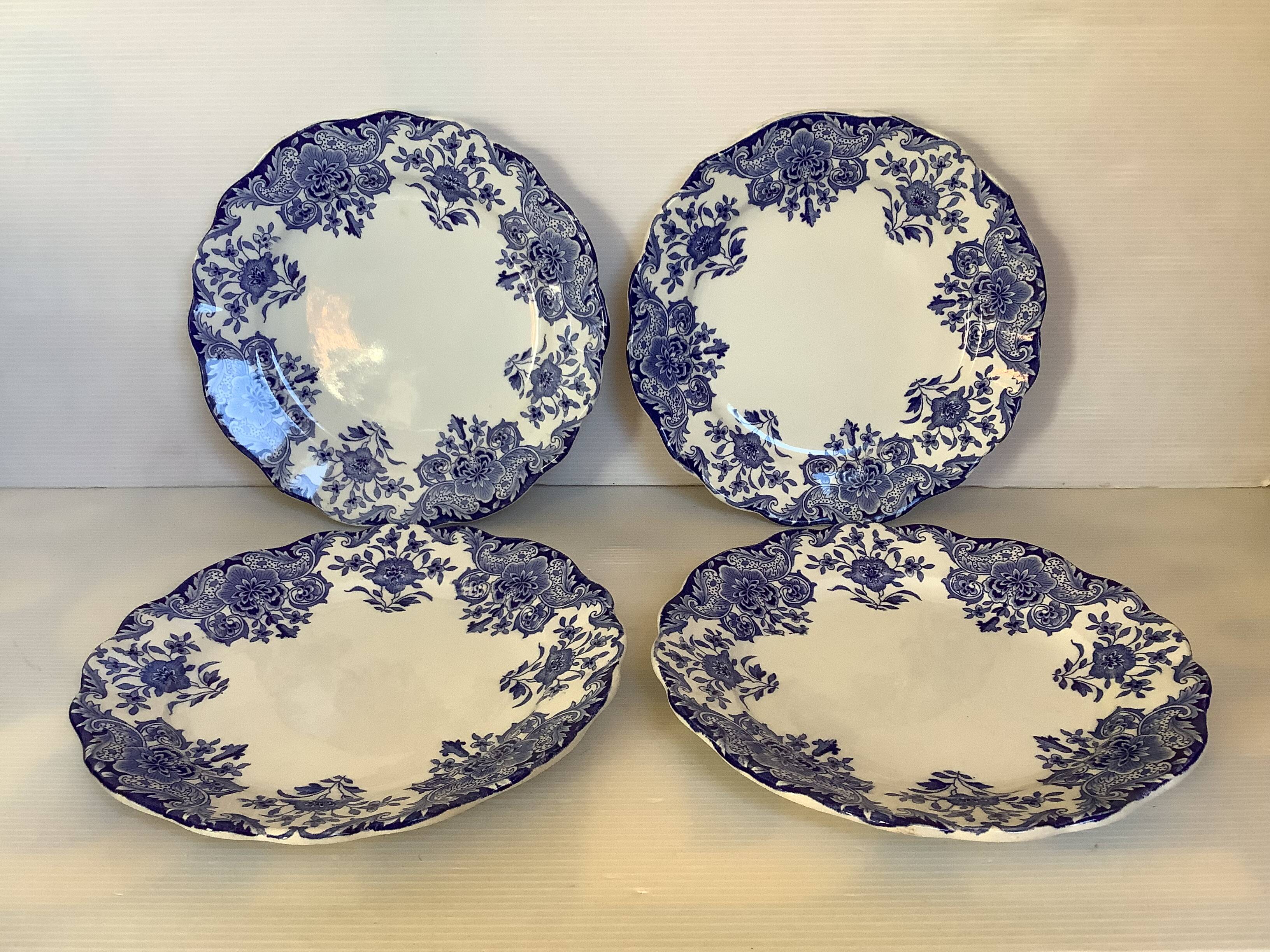 Four old Boch Brothers Dordrecht plates