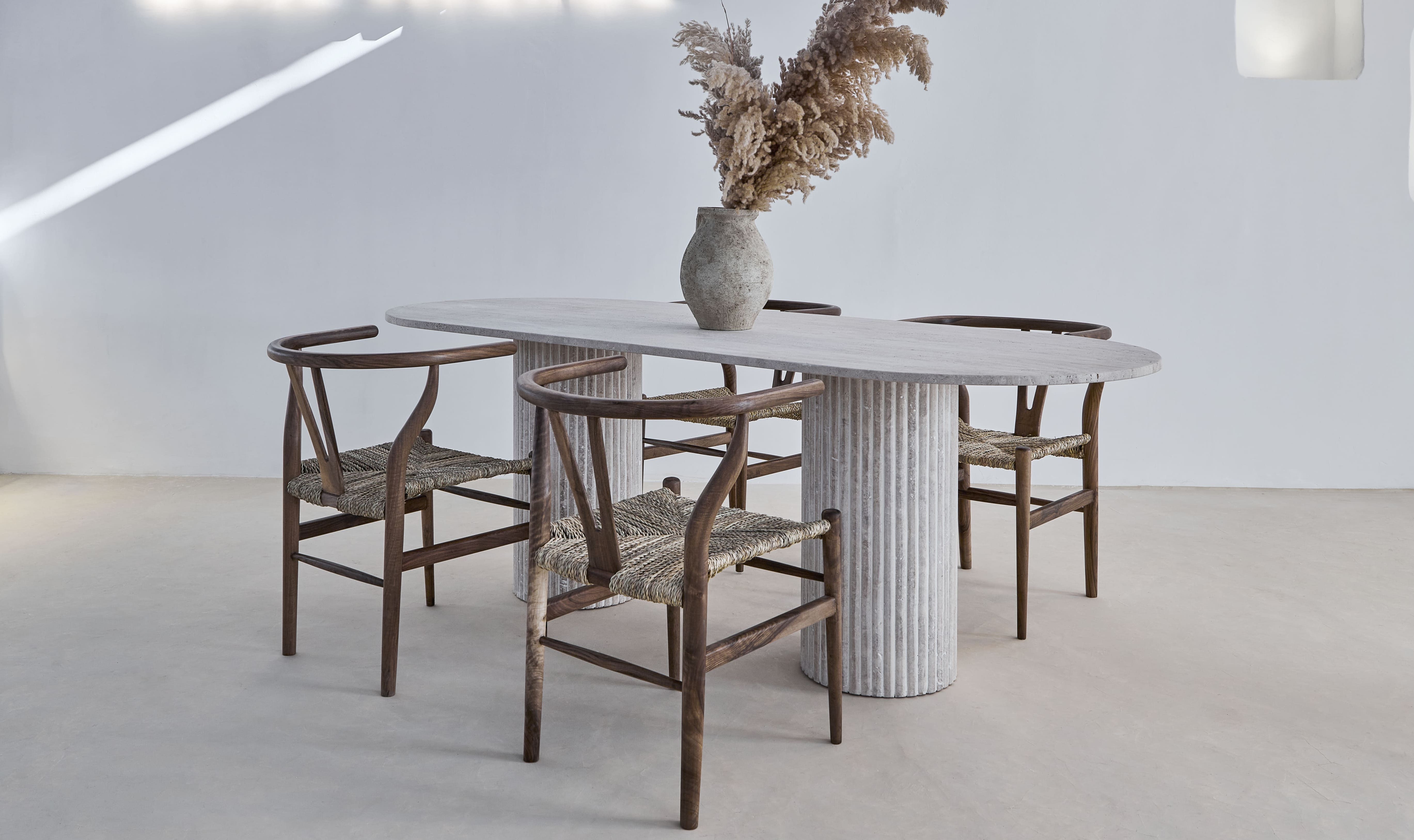 Olya oblong dining table 150x90 in natural travertine