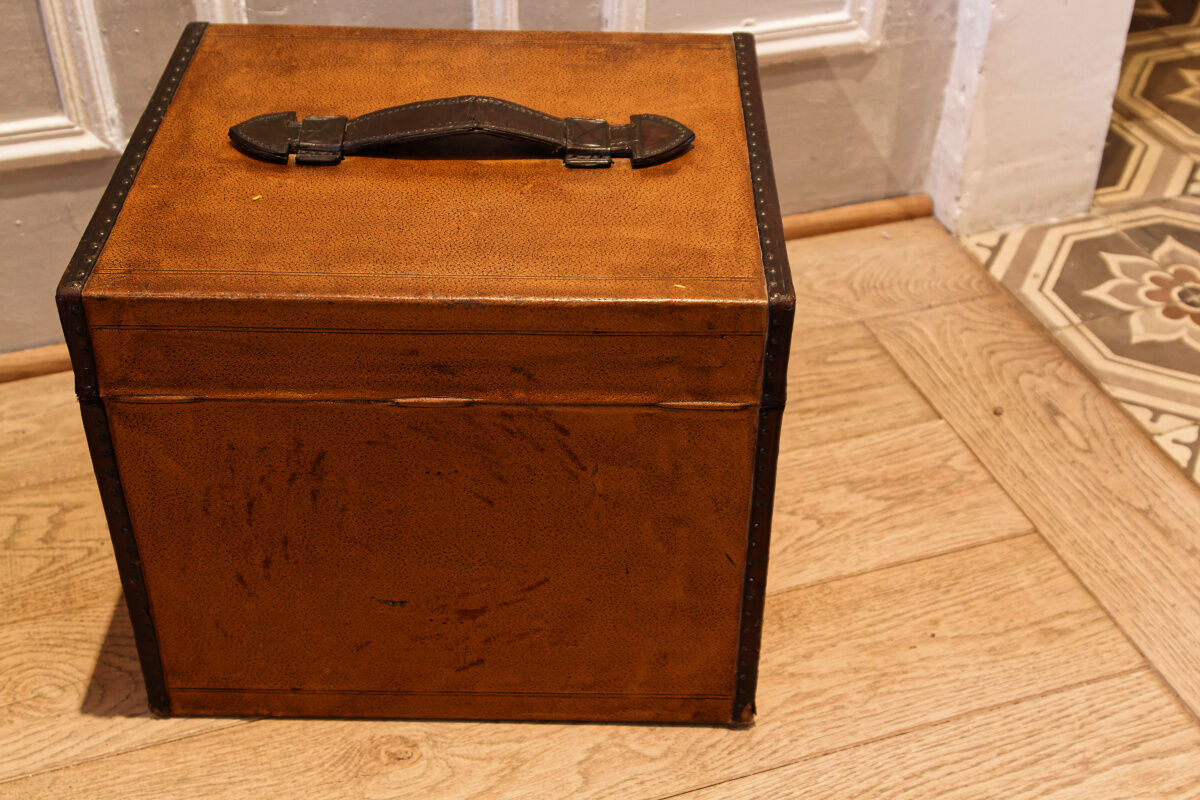 Leather and brass hat malle