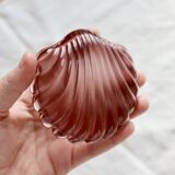 Vintage shell-shaped glass bowl in purple.