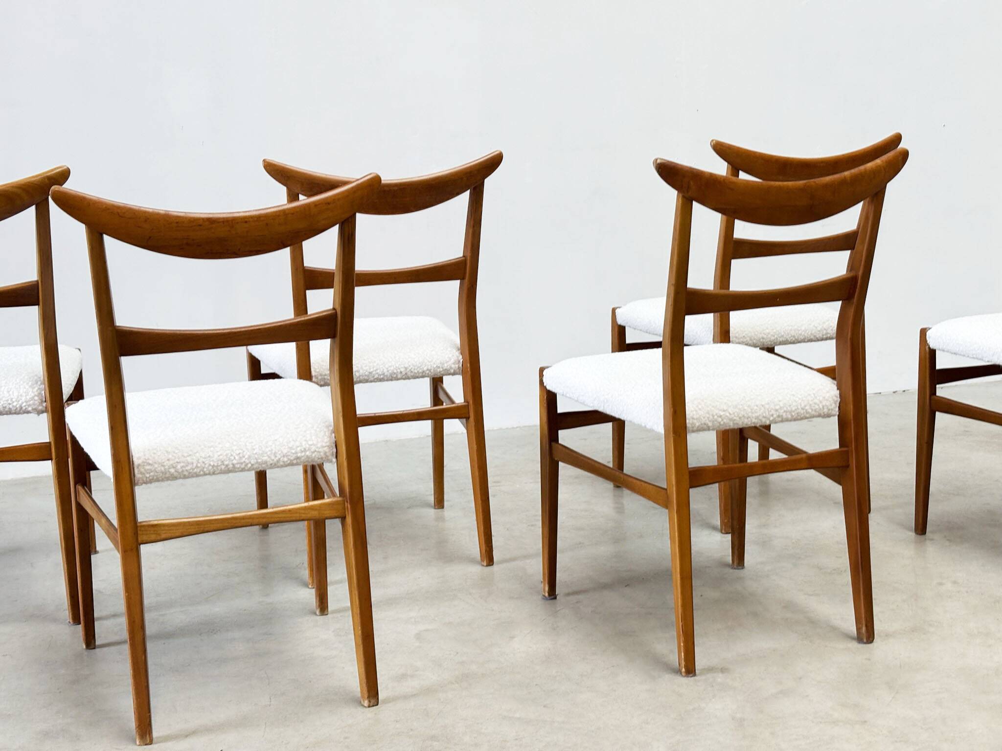 Set of six walnut Lübke dining chairs