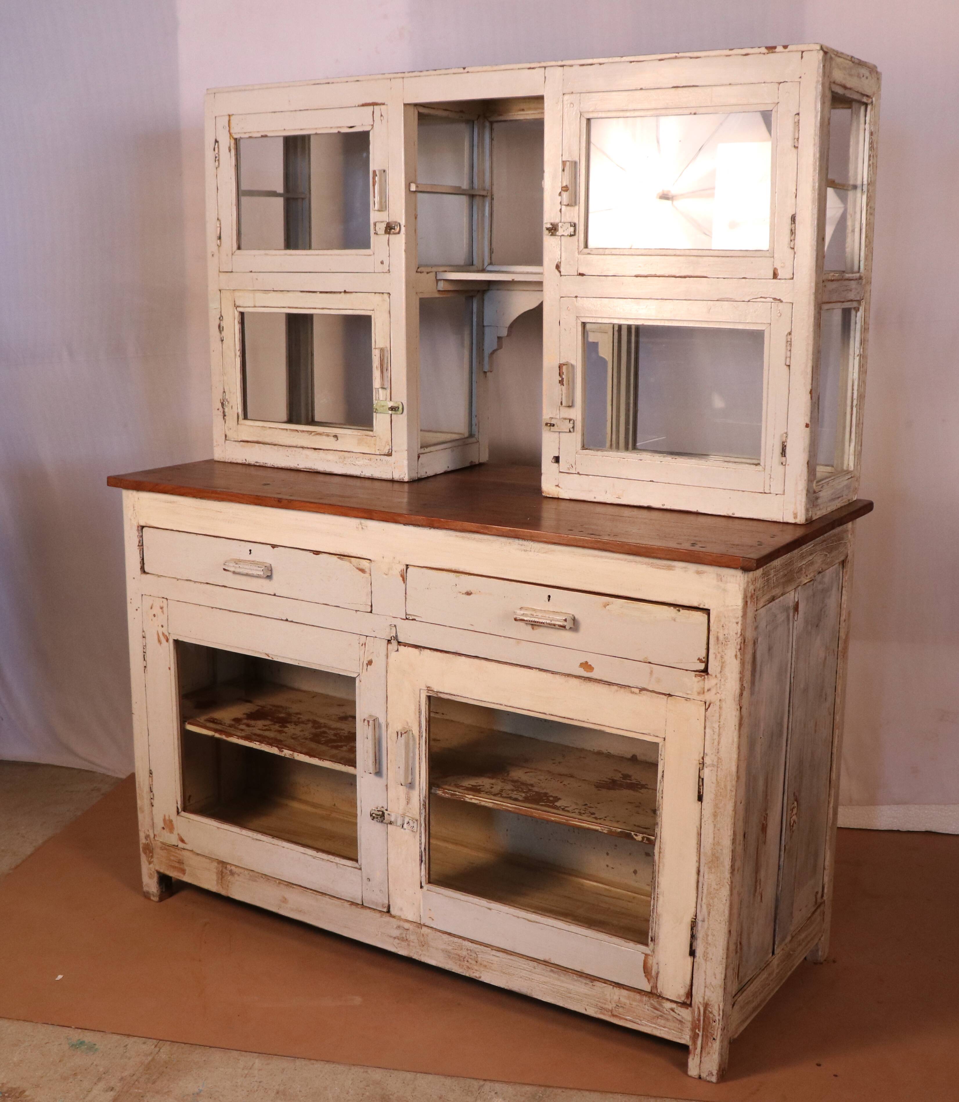 Merchant counter in Burmese teak with original white patina