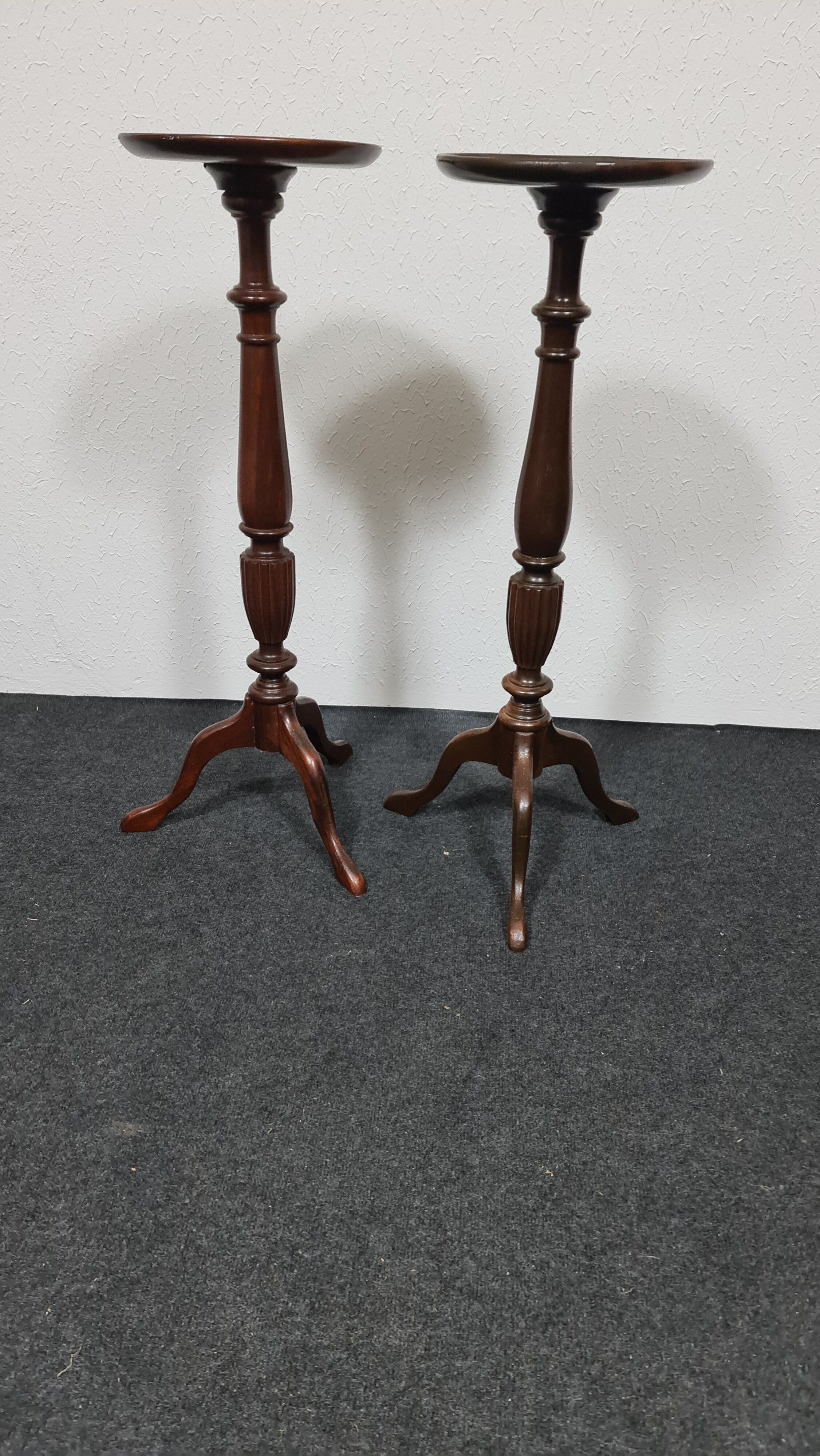 A pair of vintage flower pot stands