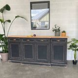 Old sideboard with four doors and four drawers