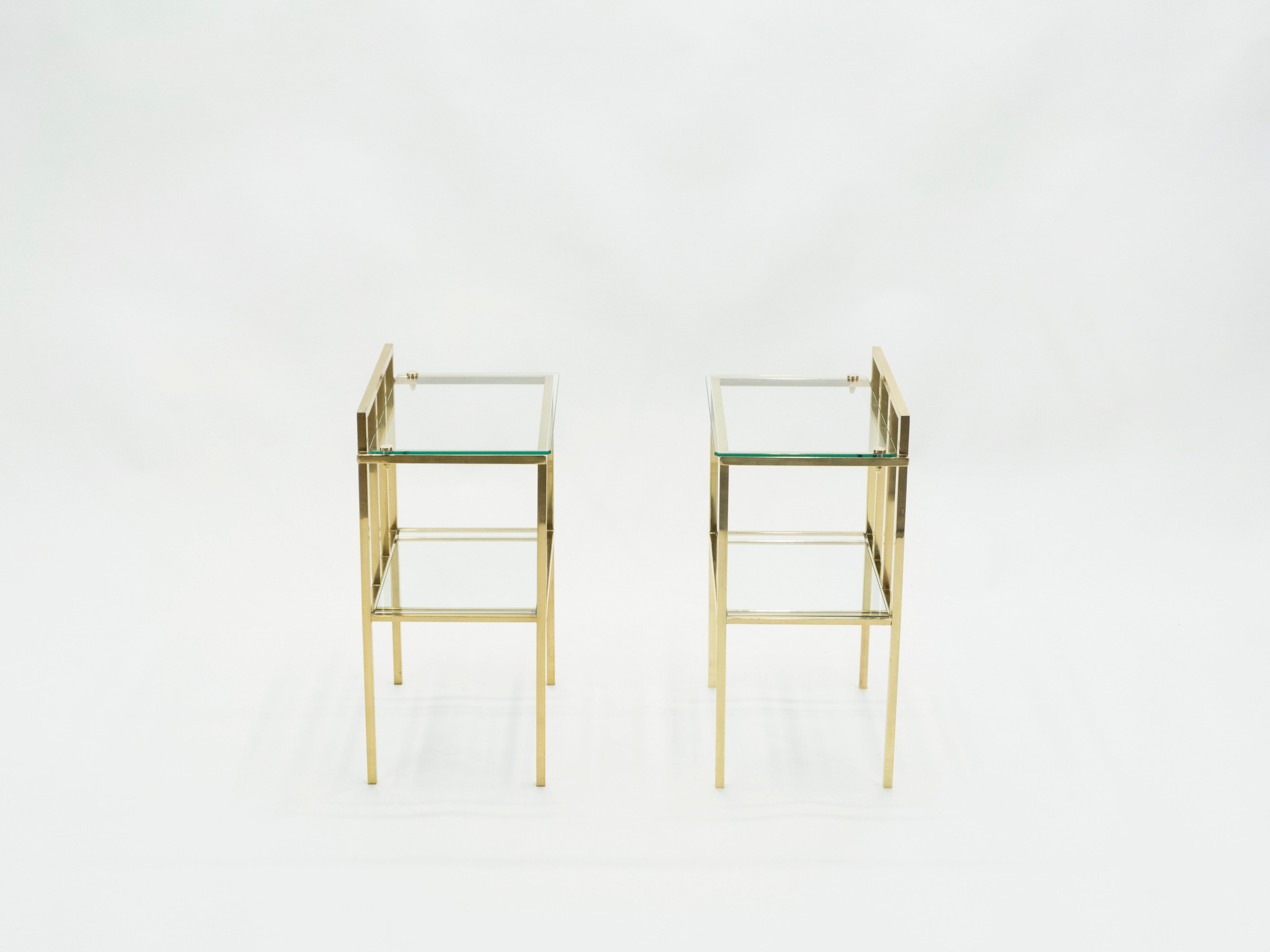 Pair of sofa tables in glass and brass 1960s