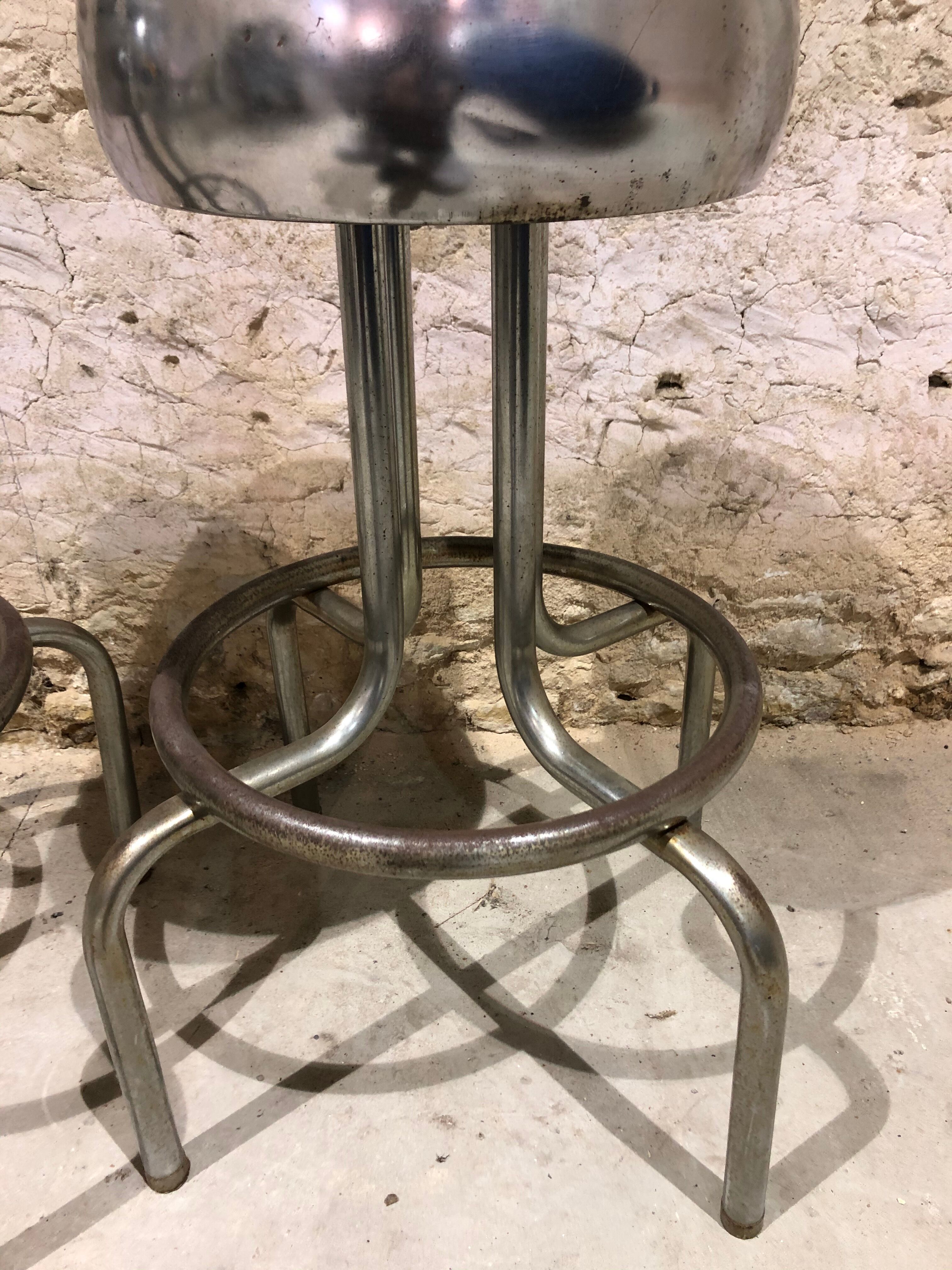 Pair of chrome metal bar stools