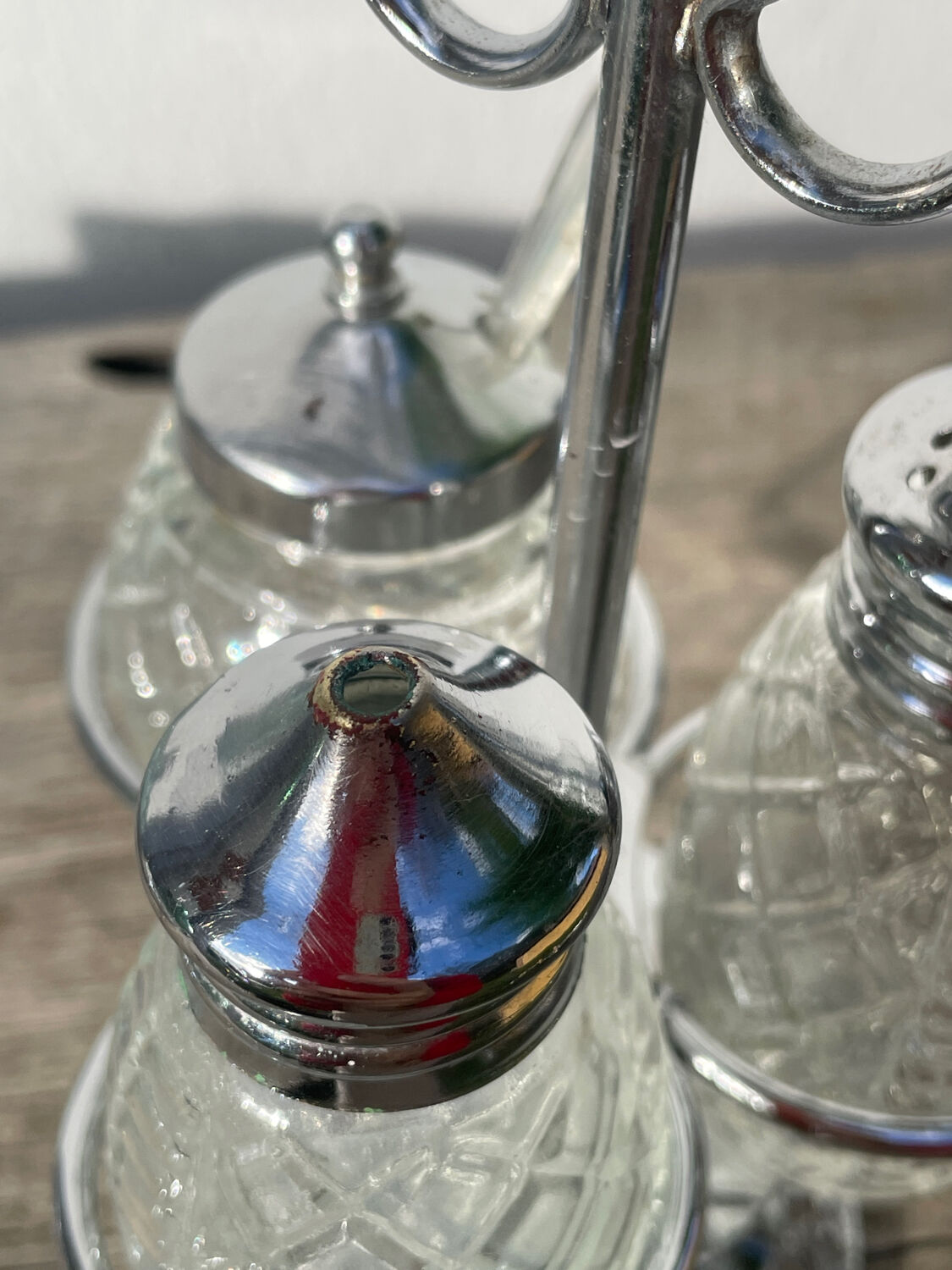 Silver-plated metal and glass salt and pepper shakers