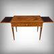 Small desk table in rosewood and rosewood marquetry, Louis XVI style – early 20th century.