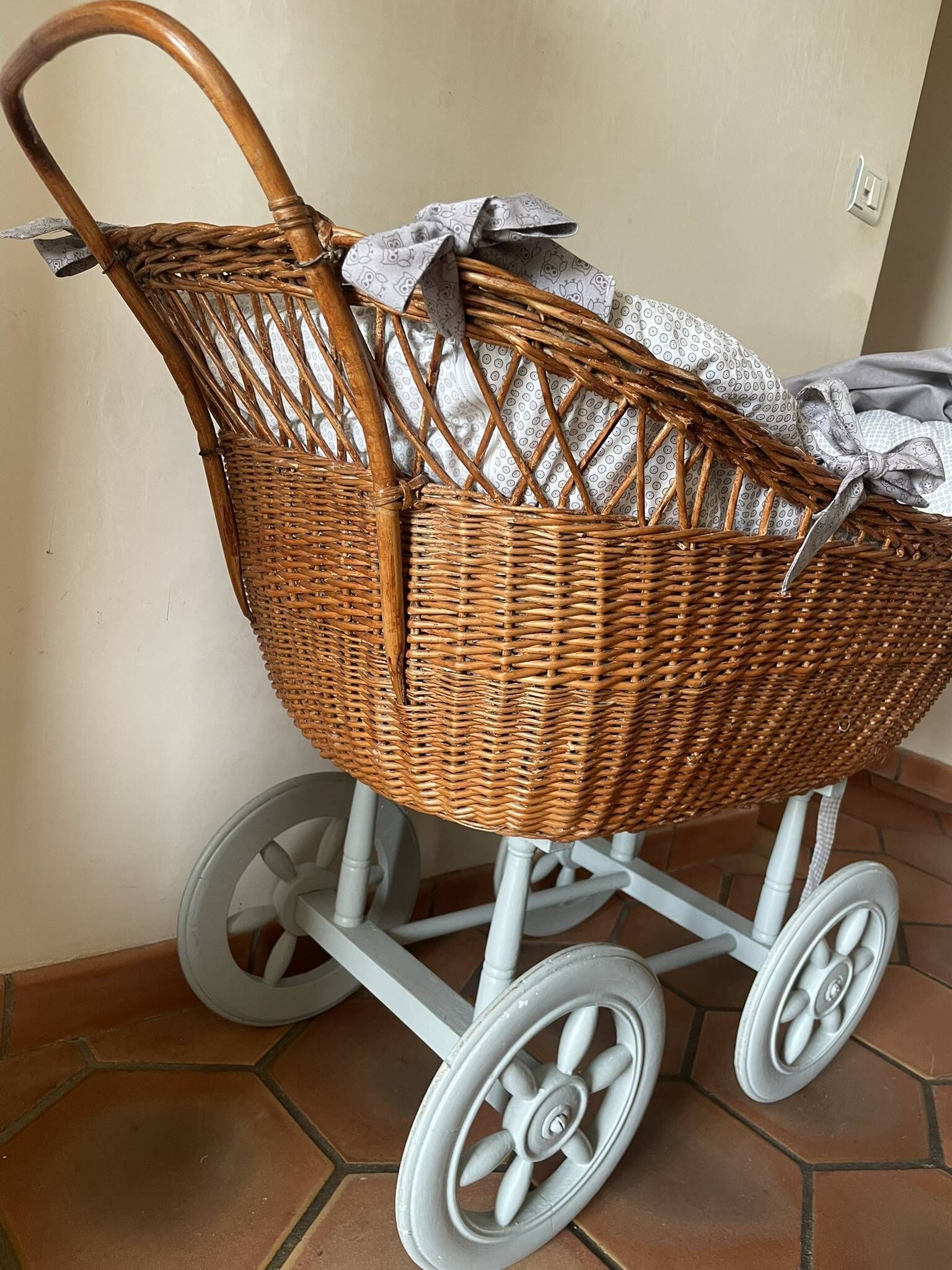 Antique rattan cradle in very good condition. Sold with or without upholstery.
