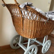 Antique rattan cradle in very good condition. Sold with or without upholstery.