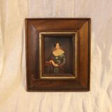 Portrait painting with wooden frame and gilding
