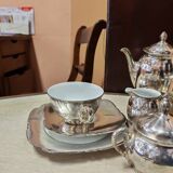 Breakfast set with tea or coffee in porcelain.