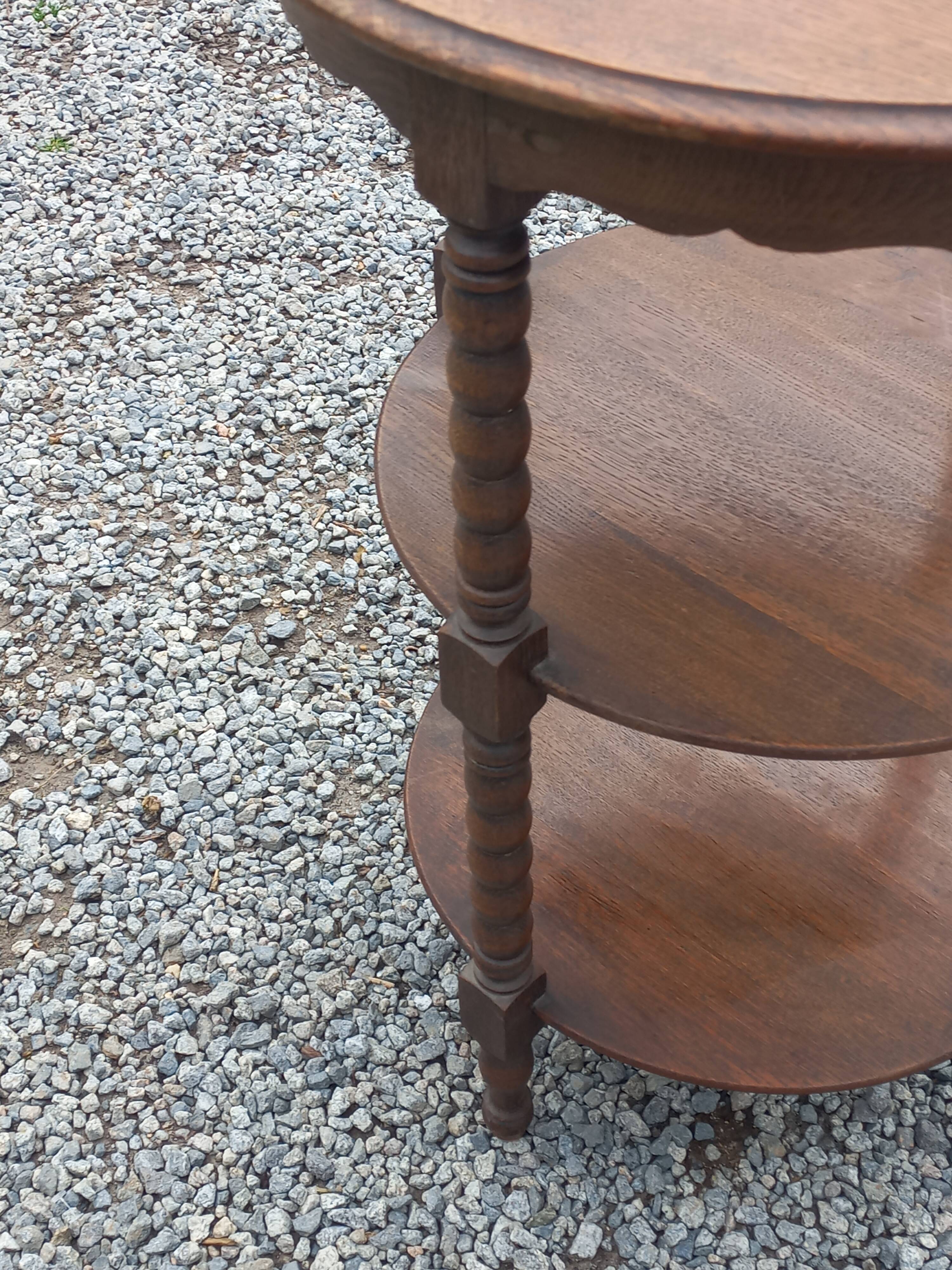 Vintage oak pedestal table with 3 shelves from the 60s