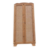 Renovated antique wardrobe in raw wood and caning.