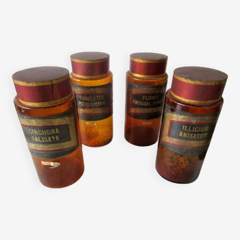 Set of 4 pharmacy jars, in amber glass.