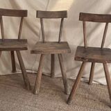 Set of three wooden tripod chairs in oak, raw art.