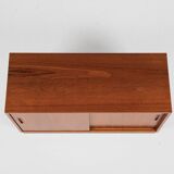 Midcentury Danish lowboard in teak with 2 sliding doors by Hundevad 1960s - 108cm