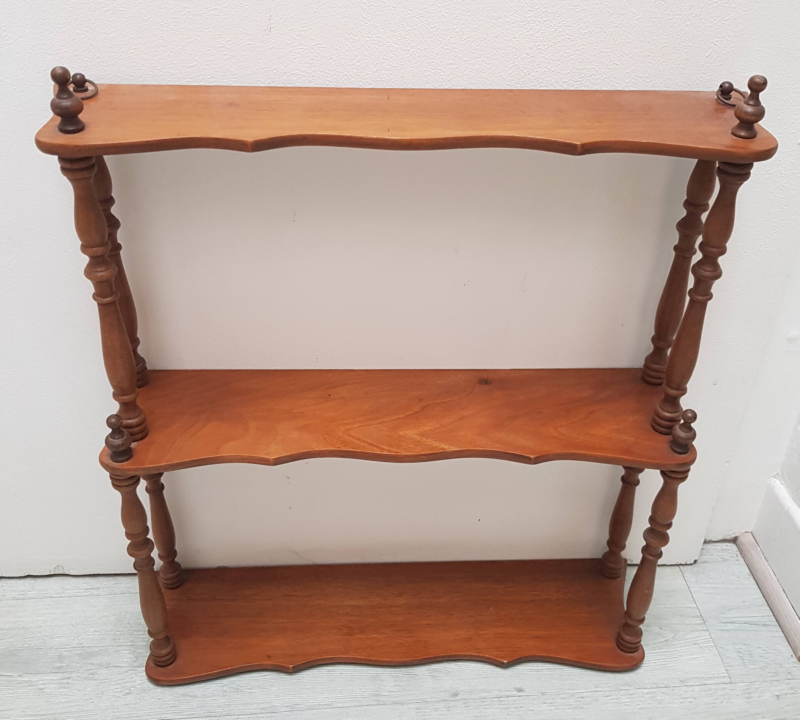 Turned wooden shelf