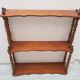 Turned wooden shelf
