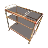 Brass and smoked glass bar trolley with casters