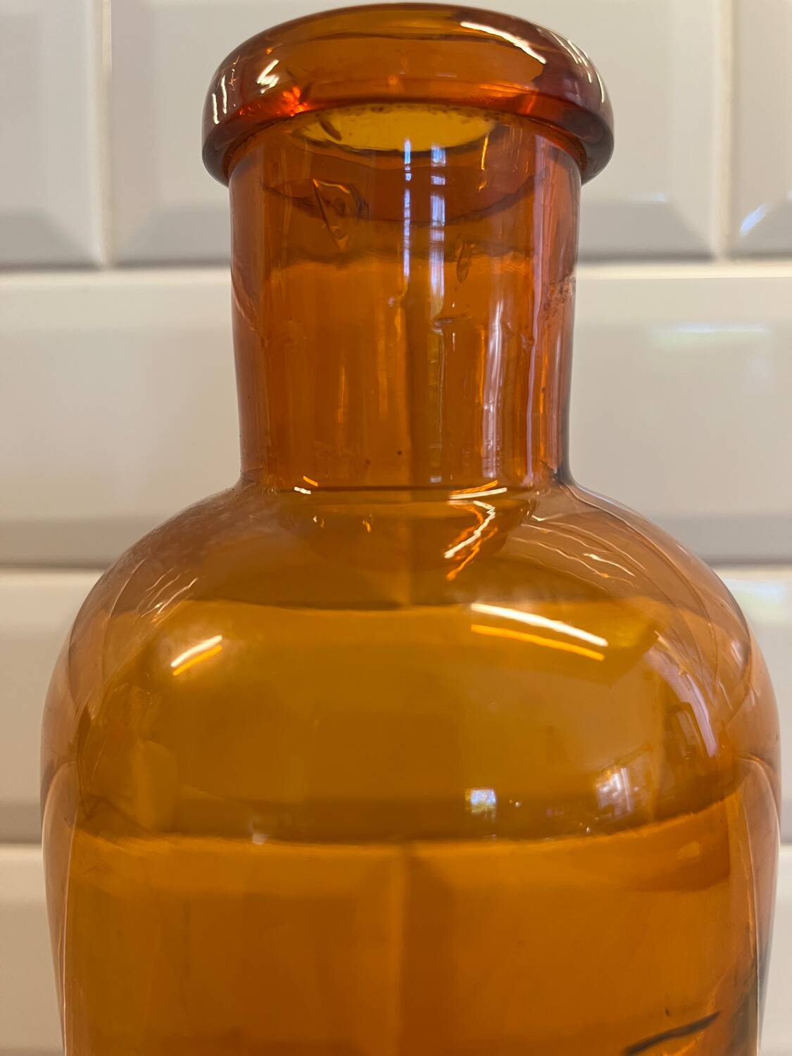 Amber glass bottle vase