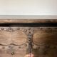 Very old elm wood with carved patterns and ironwork pieces.